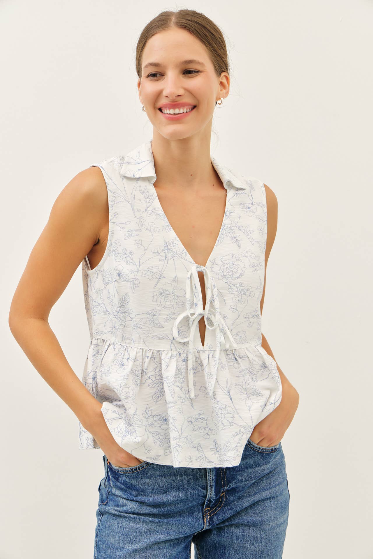 The Fancy Print Babydoll Blouse with Front Tie Detail