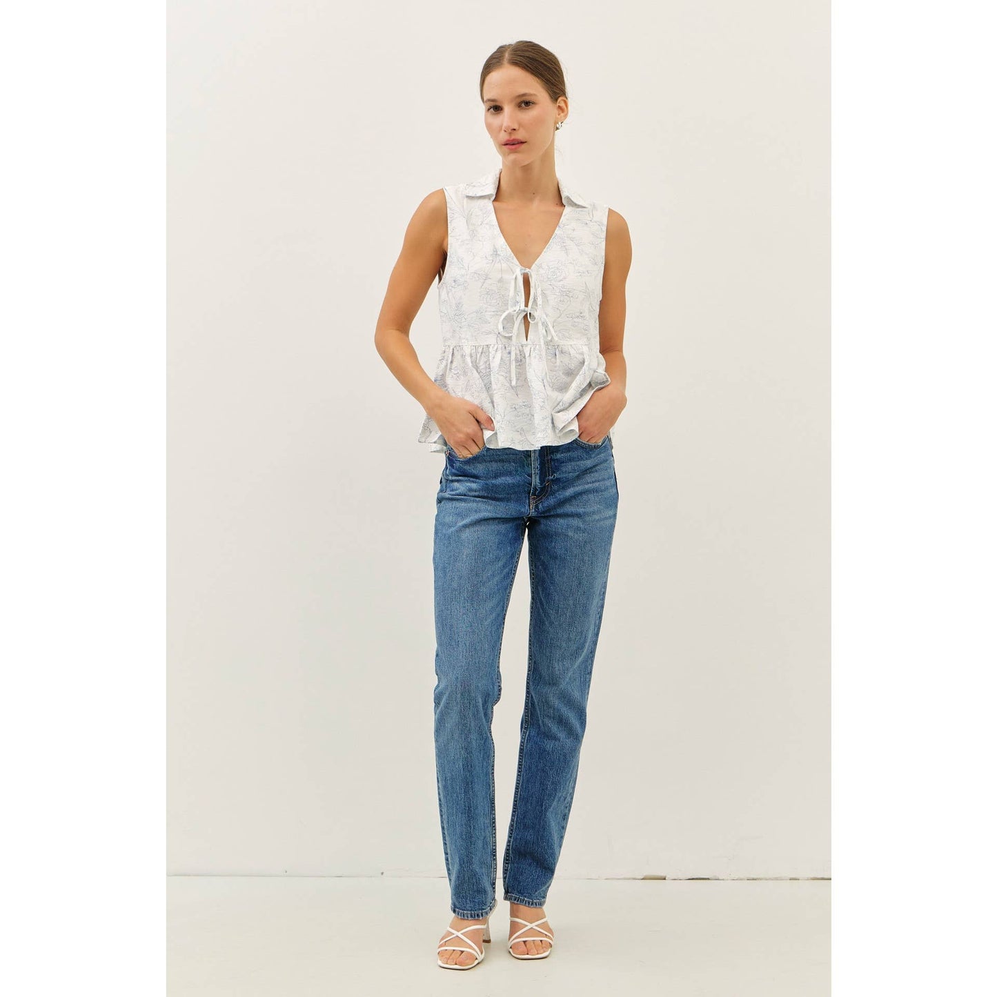 The Fancy Print Babydoll Blouse with Front Tie Detail