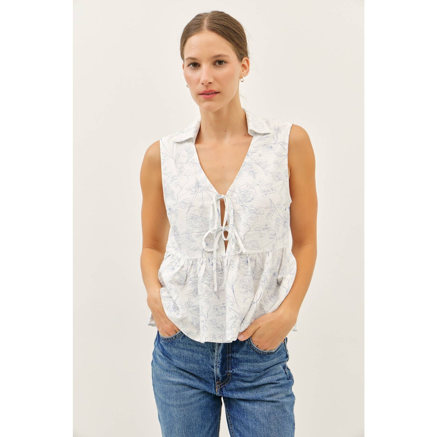 The Fancy Print Babydoll Blouse with Front Tie Detail