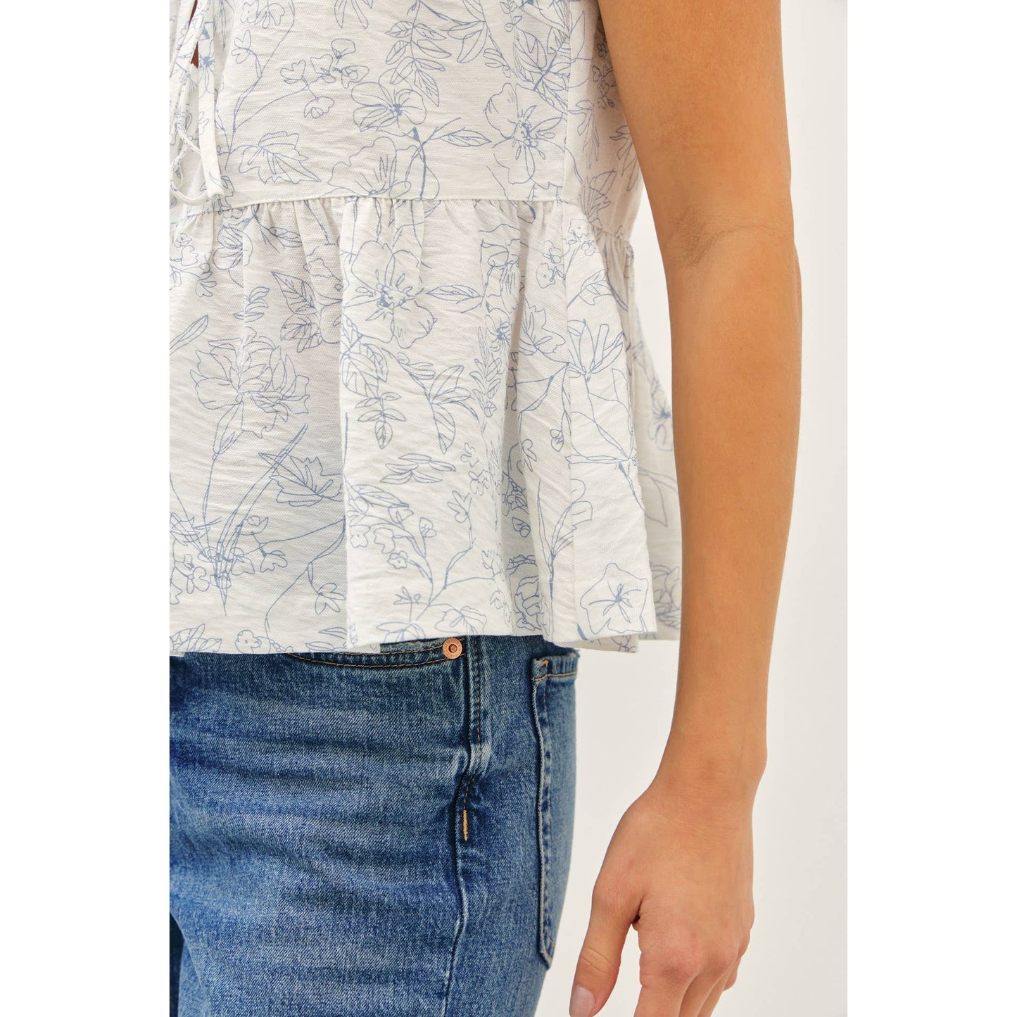 The Fancy Print Babydoll Blouse with Front Tie Detail