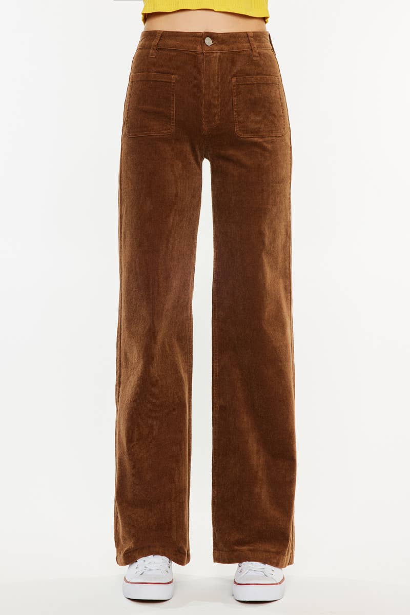Brown corduroy pants on a white background