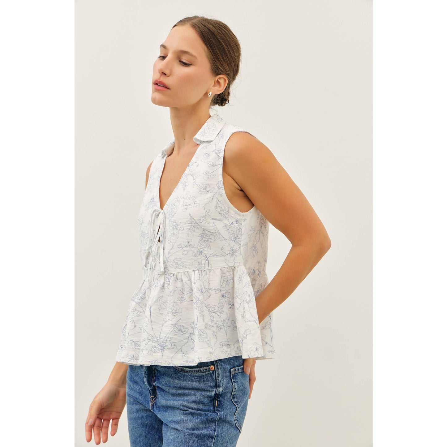 The Fancy Print Babydoll Blouse with Front Tie Detail