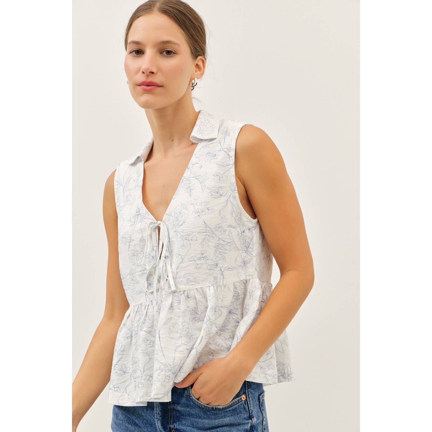 The Fancy Print Babydoll Blouse with Front Tie Detail