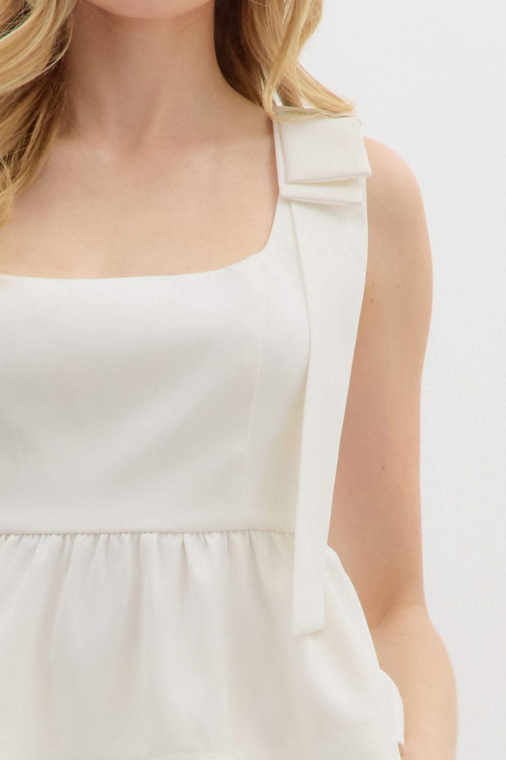 The Emmie Cream Peplum Top