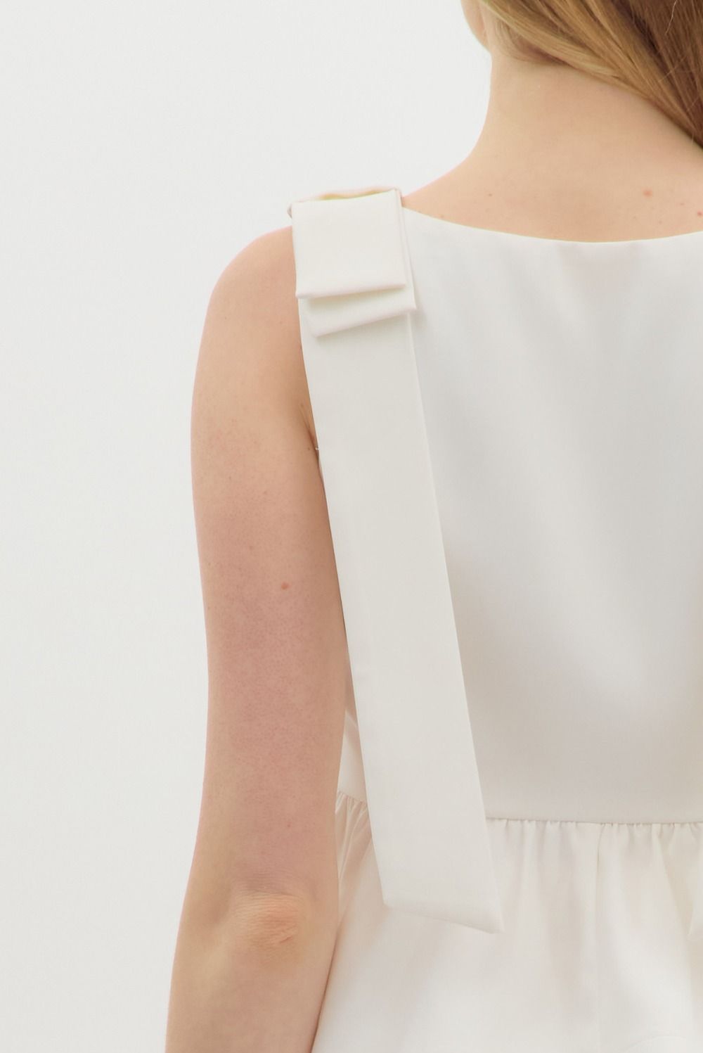 The Emmie Cream Peplum Top