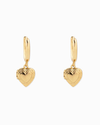 Gold hoop earrings with engraved heart locket charms in polished brass finish