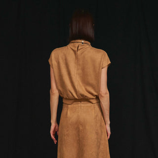Back view of camel faux suede cap-sleeve top and midi skirt set
