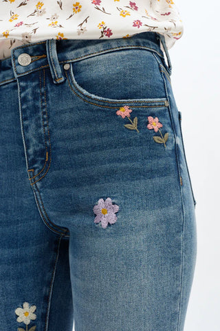 The Flora Mid Rise Bootcut Jeans