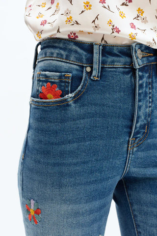 The Flora Mid Rise Bootcut Jeans