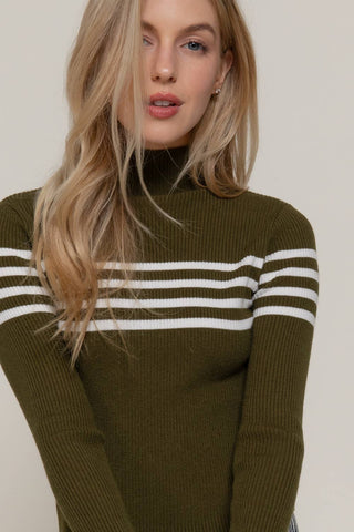 Olive green ribbed turtleneck sweater top with white chest and sleeve stripes