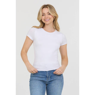 Women's white crew neck short sleeve fitted knit tee with blue jeans