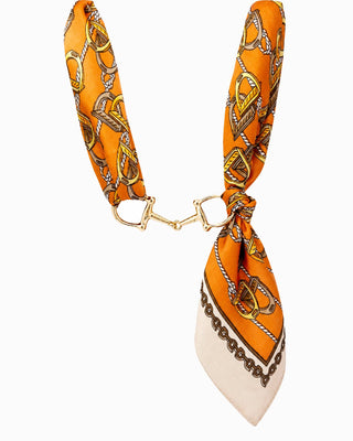 Orange silk scarf necklace with equestrian print and gold horse bit hardware closure
