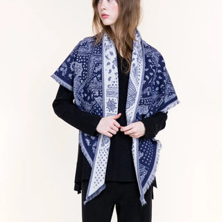 Navy blue and white paisley bandana print triangular scarf with fringe edges