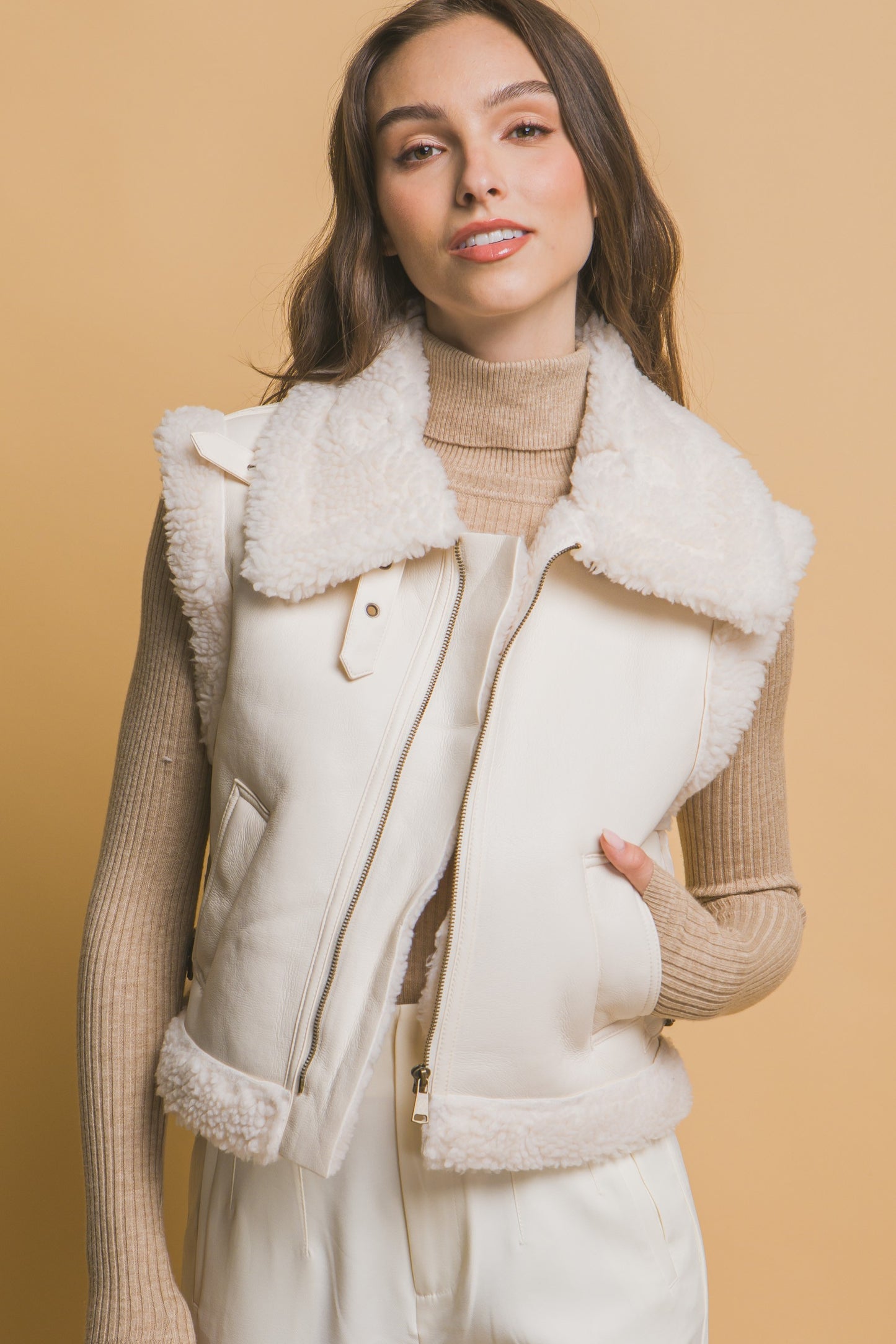 The Sloan Faux Leather Shearling Vest in Ivory