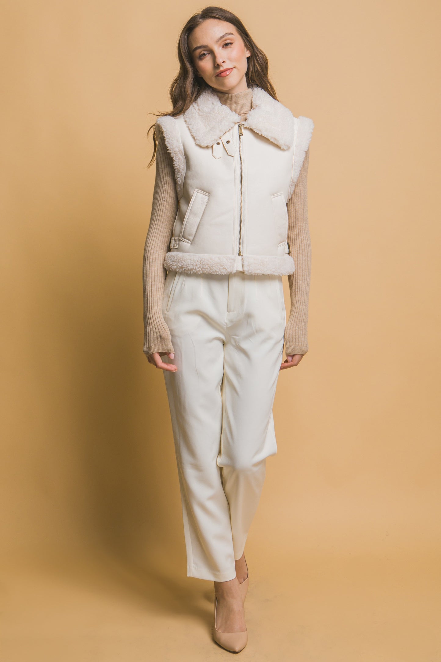 The Sloan Faux Leather Shearling Vest in Ivory