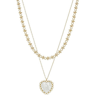 Gold layered necklace set with decorative chain and mother of pearl heart pendant
