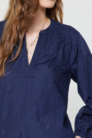 Navy blue eyelet embroidered blouse with split V-neckline and long sleeves