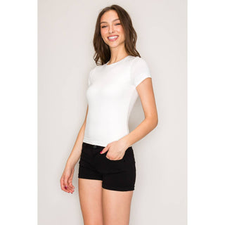 Women's white crew neck short sleeve fitted knit tee with black denim shorts