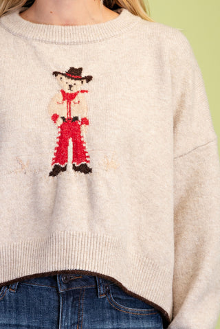 Taupe knit cropped sweater with cowboy teddy bear graphic, rolled hem, wide sleeves
