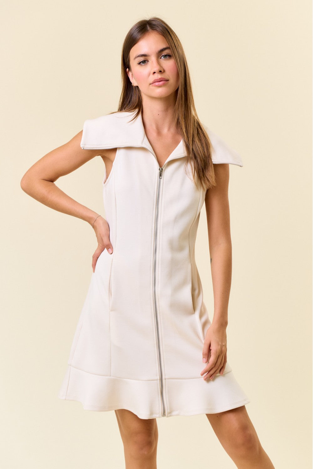 The Natasha Pointed Collar Front Zip-Up Sleeveless Ruffled Hem Mini Dress