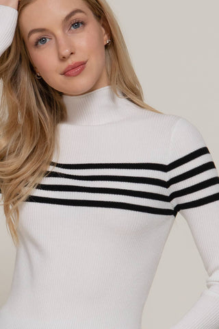 White ribbed mock neck sweater top with black horizontal chest stripes