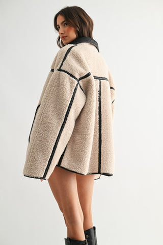 Camellia Toni reversible oversized sherpa jacket, cream with black leather trim detailing