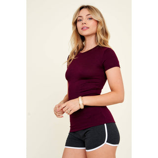 Burgundy crew neck short sleeve ribbed knit fitted basic tee on model