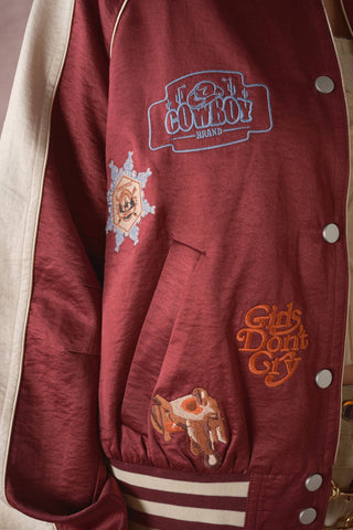 The Patsy Western Patch Satin Varsity Jacket in Rust