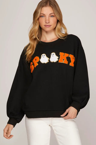 Black Halloween sweatshirt with orange chenille SPOOKY lettering and white ghost patches