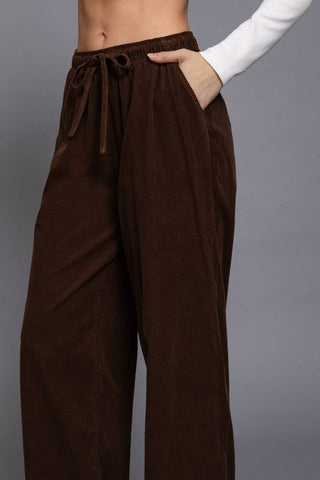 Brown corduroy wide-leg pants with elastic drawstring waist and side pocket