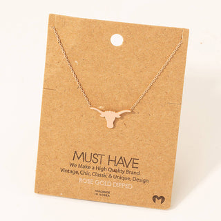 Dainty rose gold longhorn bull head pendant on delicate chain necklace