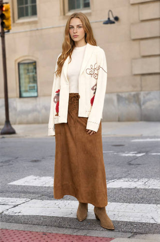 Cream knit cardigan with cowboy jacquard pattern and shawl collar, open front