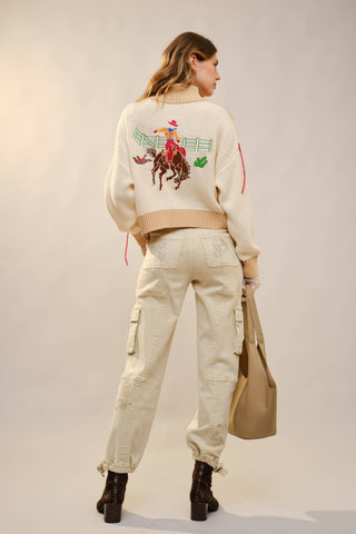 The Whimsy Embroidered Mock Neck Sweater