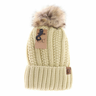Cream cable knit CC beanie with faux fur pom and ribbed cuff