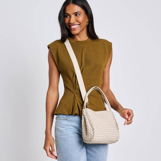 Cream woven crossbody bag with double top handles and long shoulder strap