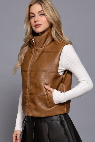 Tan faux leather zip-up vest with mock neck and side pockets