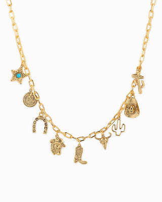 Gold chain charm necklace with western icons: cowboy boot, cactus, horseshoe, steer skull, star