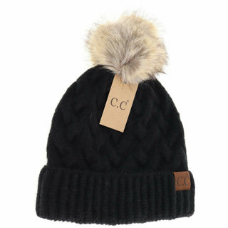 Black cable knit C.C beanie with cream faux fur pom pom and cuffed brim