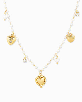 Gold heart charm pearl necklace with crystal accents and beaded chain