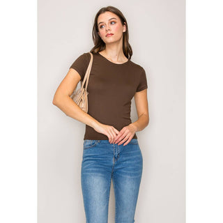Women's chocolate brown crew neck short sleeve fitted knit tee with blue jeans