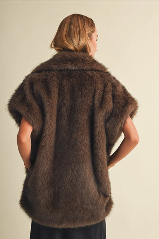 Cappuccino brown faux fur vest with lapel collar and short sleeves, back view