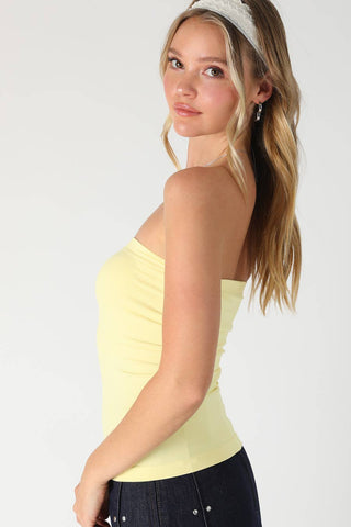 NIKIBIKI pale yellow strapless two-layer tube top, side view on model