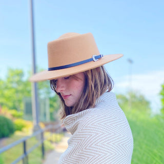 Camel wide-brim felt rancher hat with navy leather belt and silver buckle
