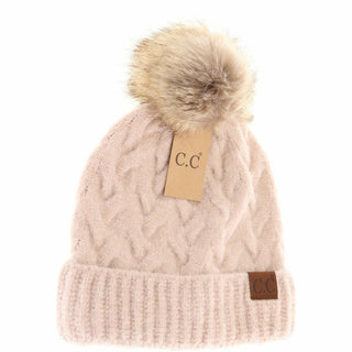 Blush pink cable knit beanie with faux fur pom and C.C leather logo patch