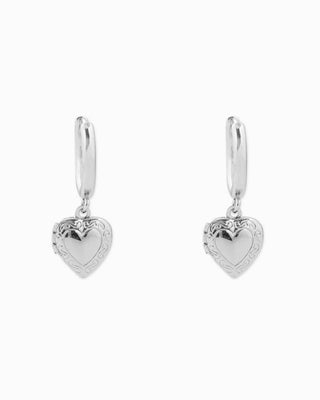 Sessori silver hoop earrings with dangling heart-shaped locket charms and filigree detailing
