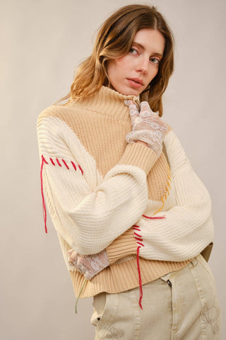 The Whimsy Embroidered Mock Neck Sweater