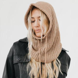 Bailey Balaclava in tan chunky knit with hood and drawstring ties