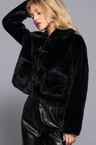Black faux fur cropped duffle jacket with toggle closures and patch pockets