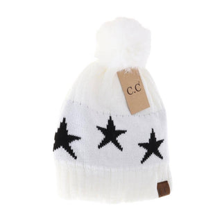 White knit pom beanie with three black star pattern and C.C brand tag