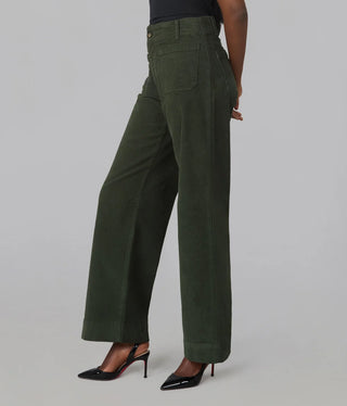 High rise wide leg olive green corduroy pants with patch pockets, worn with black heels